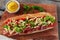 Sandwich baguette ham jamon cheese with tomato and herbs