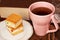 Sandwich cookies with jelly, pink Cup of tea