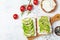 Sandwich with creamy cheese and avocado for healthy snack or breakfast. Top view