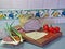 Sandwich fixings with Mexican Tile background