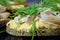 Sandwich with fried perch fish fillets, spicy cream cheese and dill