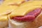 Sandwich with meat and cheese on the colorful background