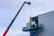 Sandwich panels wall mounting using crane and scissor lift