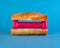 Sandwich with pink fitness dumbbell side view