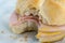 Sandwich with poor quality salami parizer made of a paste consist in pork scraps pig skin and other low quality meats poor poverty