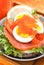 Sandwich with salted salmon, egg and red caviar