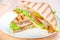 Sandwich with turkey, cheese and vegetables,