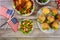 Sandwiches, chicken and salad on wooden table