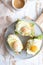 Sandwiches with cream cheese, fresh green salad, salmon and baked egg