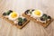 Sandwiches from crispbread with liver pate, eggs, mayonnaise and