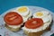 Sandwiches from a loaf with cheese, egg, tomato