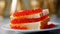 Sandwiches with red caviar on white plate close up