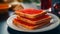 Sandwiches with red caviar on white plate close up