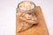 Sandwiches with rillettes, meat pate on a wooden cutting board. Rustic composition with spread meat product.
