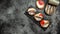 Sandwiches with sprats, Smoked sprat sandwich fish, fresh tomato and onion. Long banner format, top view