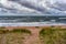 The sandy beach of the Baltic in a storm