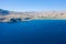 The sandy beach at the foot of the arid mountains , in Europe, Greece, Crete, Kato Zakros, By the Mediterranean Sea, in summer, on