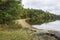 Sandy Beach on a Forested Lake in Autumn - Ontario, Canada