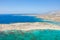The sandy beach and its heavenly colored water, in Europe, Greece, Crete, Elafonisi, By the Mediterranean Sea, in summer, on a