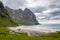 Sandy beach with mountains and sea coast, Lofoten, Norway