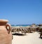 Sandy beach and palm huts