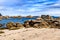 Sandy Beach And Pink Granit Boulders At The Atlantic Coast Of Ploumanach In Brittany, France