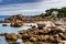 Sandy Beach And Pink Granit Boulders At The Atlantic Coast Of Ploumanach In Brittany, France