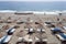 Sandy beach with sun loungers and straw umbrellas on the Turkish sea coast, Mediterranean sea