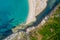 Sandy beach surrounded by sea and river