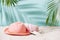 Sandy beach with towel, hat and summer accessories with copy spa