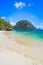 Sandy beach with an traditional banca boat in clear water, El Nido, Palawan, Philippines