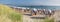 Sandy beach and traditional wooden beach chairs on island Rugen