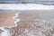 Sandy beach and waves, ocean shore