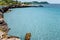 Sandy bottom of a shallow blue bay near the island of Komodo in Indonesia. This area has some of the best scuba diving in the