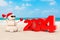 Sandy Christmas Snowman at Sunny Beach with 2024 New Year Sign. 3d Rendering