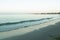 The sandy coastline evening abandoned by tourists