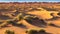 A sandy desert with tall dunes and grass bushes on a sunny, hot day. AI generation