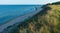 Sandy deserted beach along the steep shore of the Black Sea