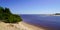 Sandy natural beach with blue water on Lake of Lacanau in Gironde france