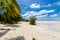 Sandy paradise beach of azure turquoise blue shallow lagoon, North Tarawa atoll, Kiribati, Gilbert Islands, Micronesia, Oceania.