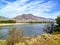 The sandy river bank of the North Thompson river in the beautiful dry landscape of Kamloops, British Columbia, Canada.