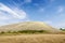 Sandy-rocky hill in the steppe. Snake Mountain, natural landmark