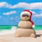 Sandy Snowman in Christmas Santa hat and sunglasses at tropical
