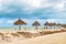 Sandy street and windy cloudy beach sandbank on Holbox Mexico