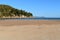 Sandy tropical beach scene, Geoffrey Bay, Magnetic Island, QLD, Australia