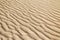 Sandy waves on the beach texture pattern