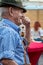 SANFORD, FLORIDA - OCT 14, 2016 - German Festival. An older man in traditional lederhosen laughs happily and enjoys the music fest