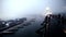 SANGKHLABURI, THAILAND - DECEMBER 27, 2015: Traveler crowd walking on Sapan Mon Bridge, wooden bridge across the river in morning