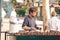 Sanish street food: man selling chestnuts on the street