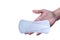 Sanitary napkin in woman hand in front of white background